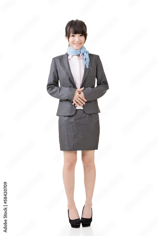 Asian business woman standing with hands on belly Asian business woman standing with hands on belly
