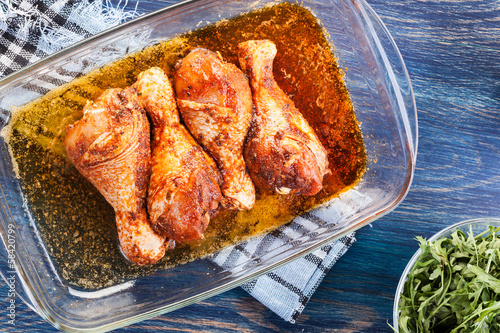 Marinated chicken drumsticks photo