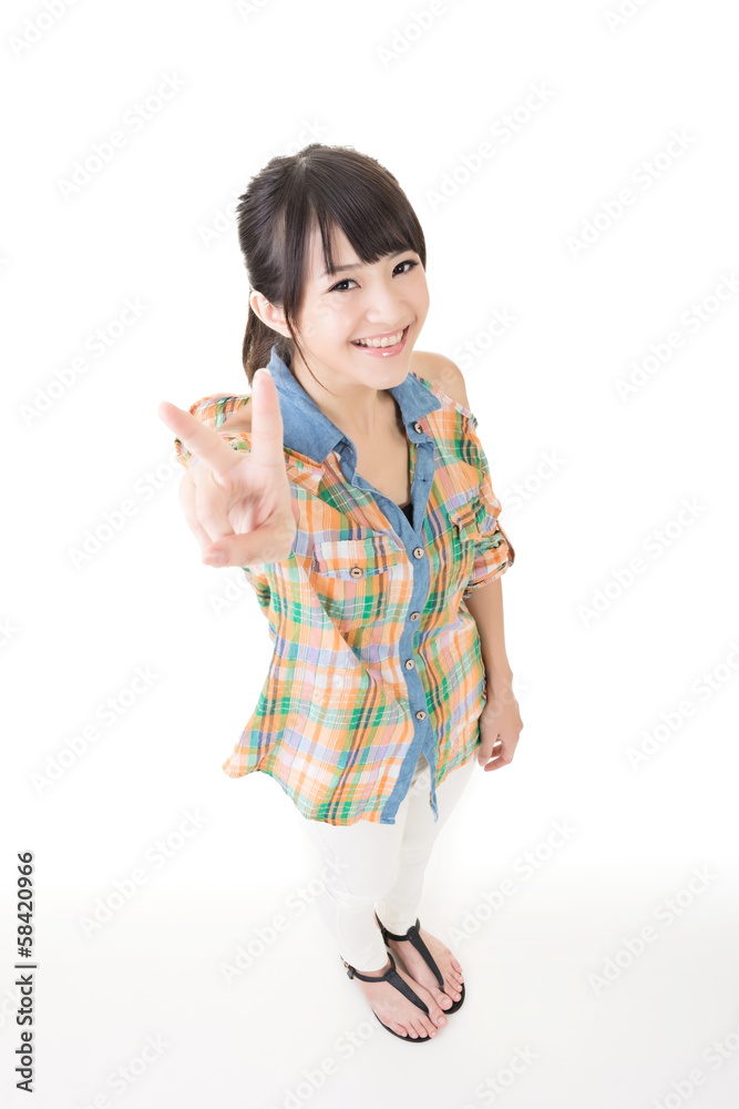 Young asian woman showing the peace or victory hand sign