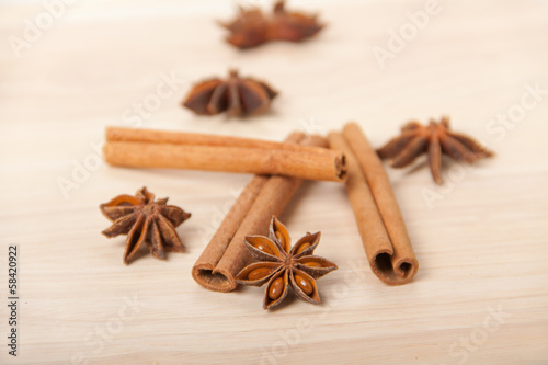 cinnamon and star anise on wooden background