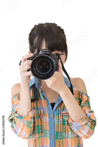 Asian woman takes images with photo camera