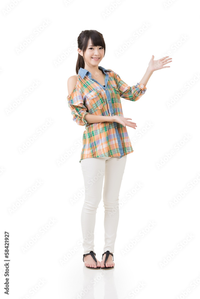 Young asian woman shows or introduce something Young asian woman shows or introduce something
