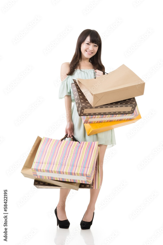 Attractive asian woman holding shopping bags Attractive asian woman holding shopping bags