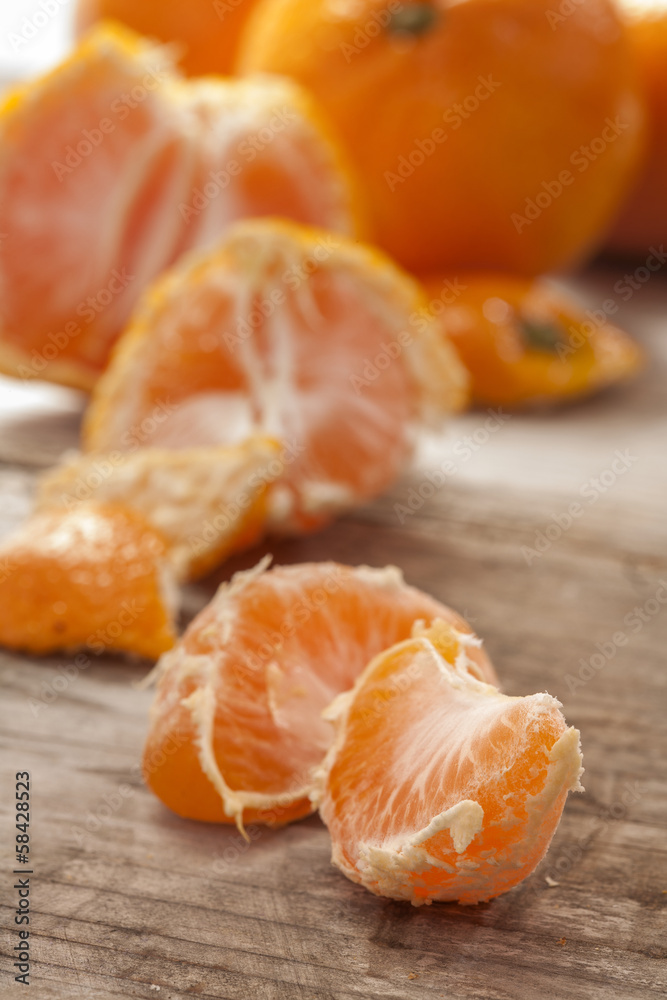 Fresh and juicy mandarin fruits on wooden table Fresh and juicy mandarin fruits on wooden table