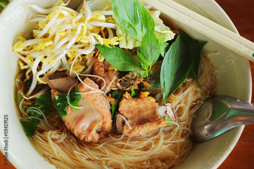 Pork noodles in soup asian style