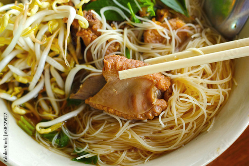 Pork noodles in soup asian style