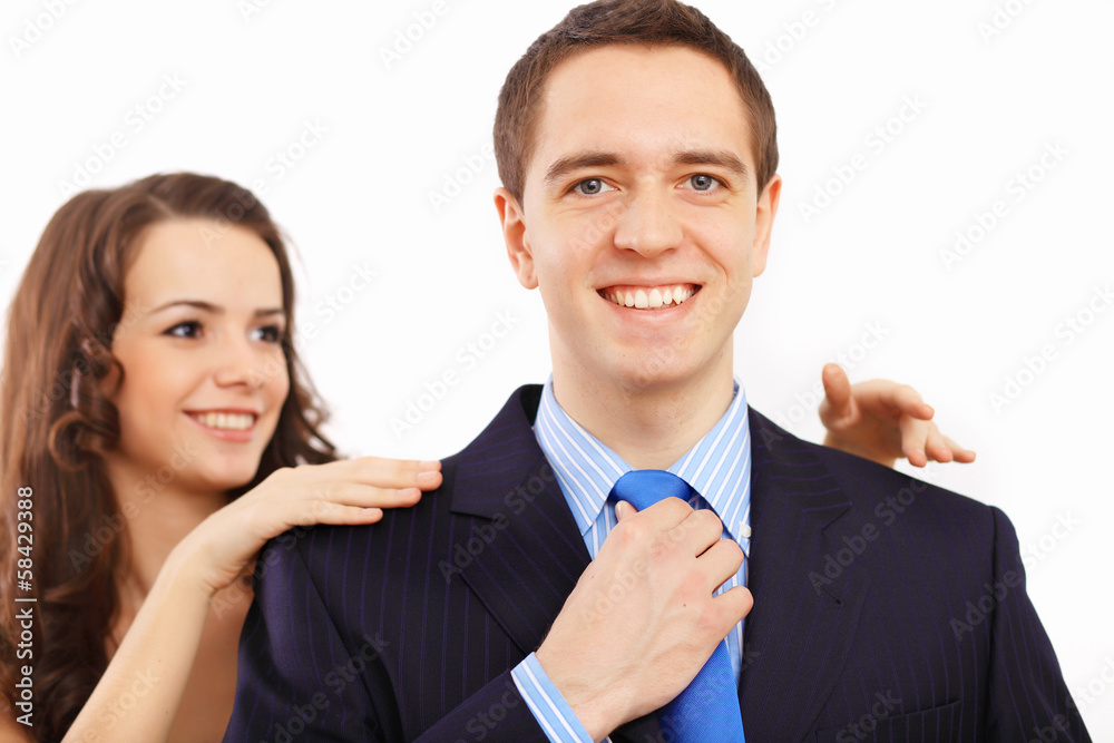 Businessman dressing at home in the morning Businessman dressing at home in the morning