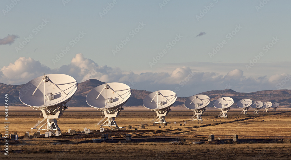 Very Large Array satellite dishes at Sunset in New Mexico, USA