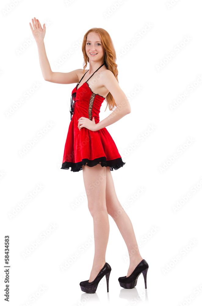 Redhead in red dress on white background Redhead in red dress on white background