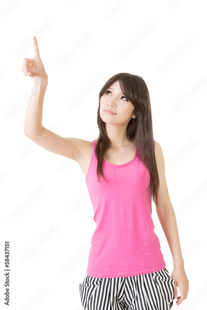 Fototapeta premium Young pretty asian woman pointin