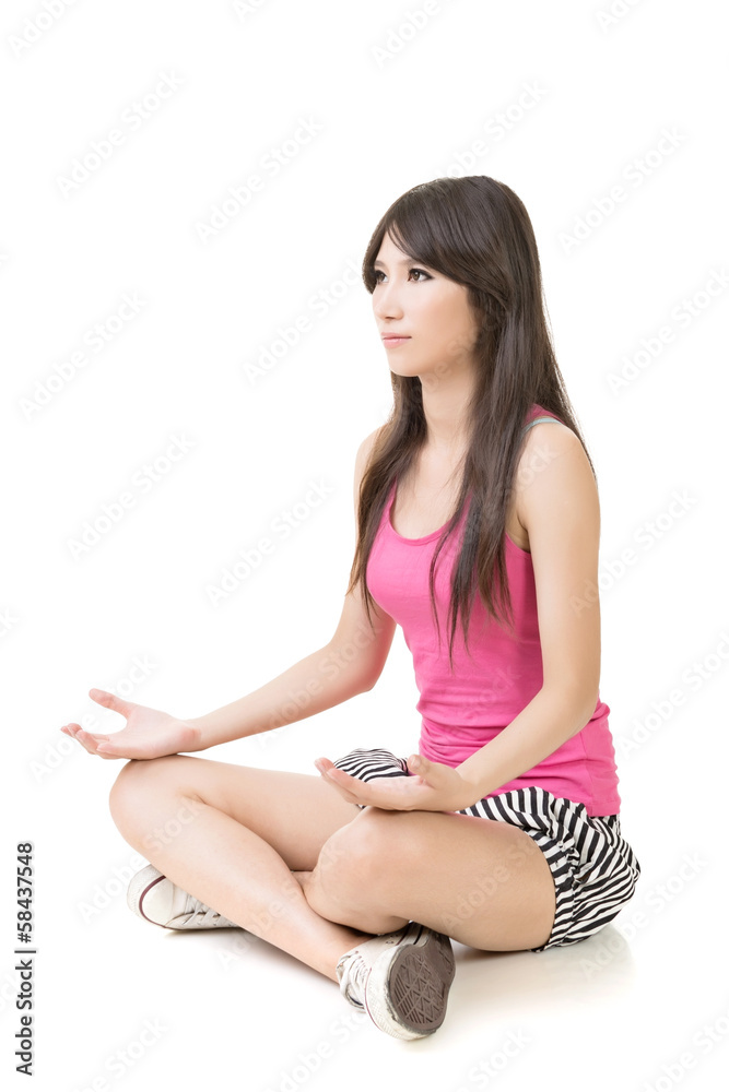 Portrait of a beautiful asian woman in yoga pose Portrait of a beautiful asian woman in yoga pose