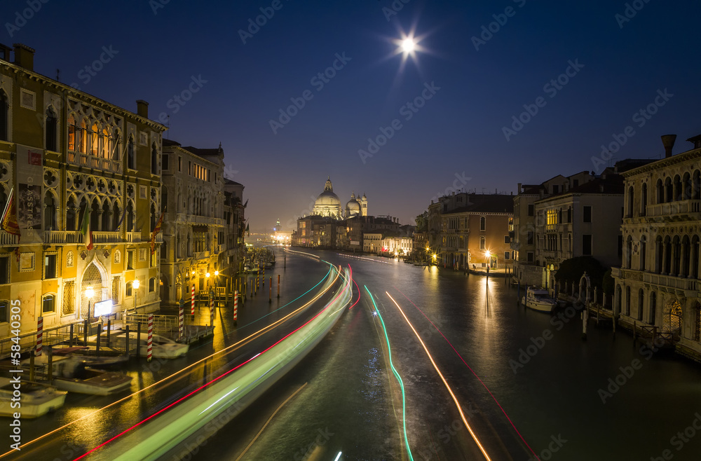 Night View of Venice with Blurred Motion of Boats Night View of Venice with Blurred Motion of Boats