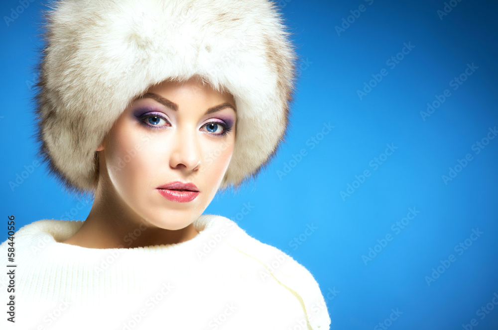 Portrait of a young and beautiful woman in a winter hat Portrait of a young and beautiful woman in a winter hat