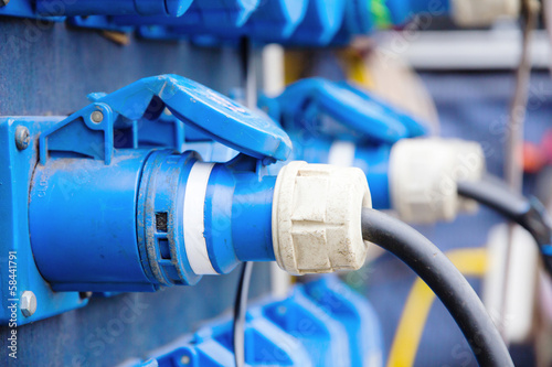 power plugs connected in industrial plant