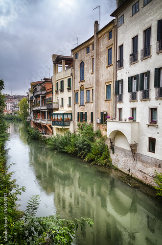 Traditional Italian Buildings by a River