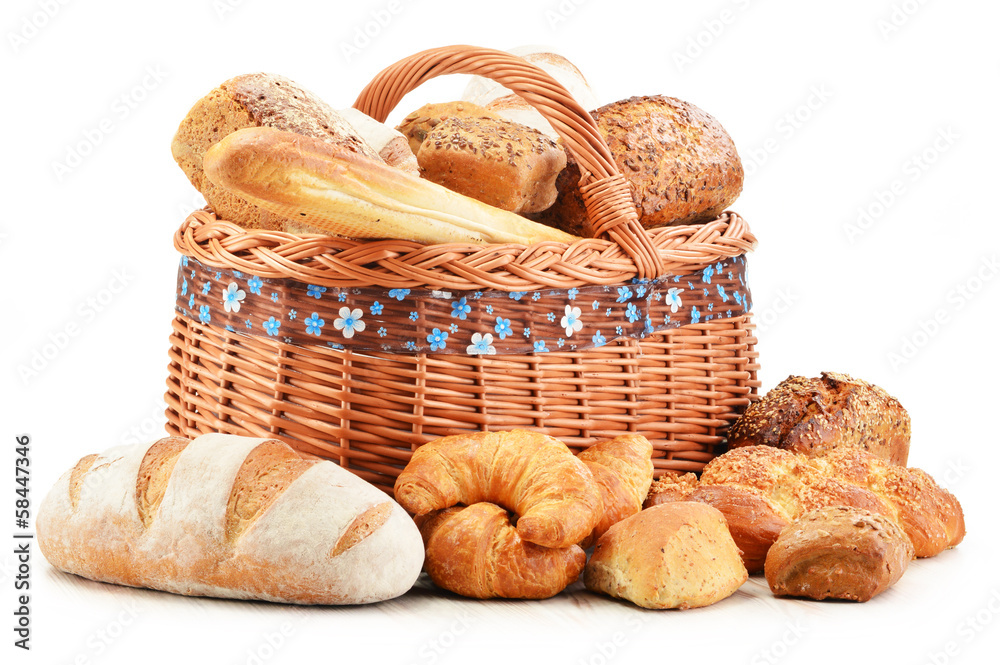 Wicker basket with baking products isolated on white