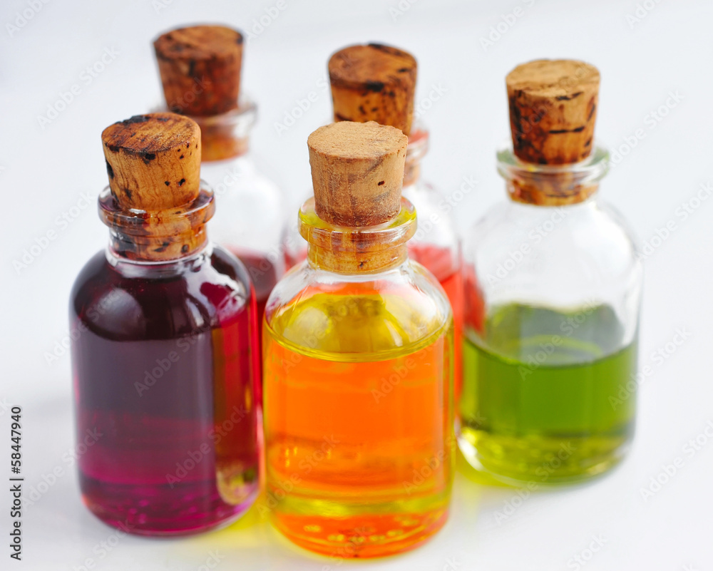 Bottles with basics oils isolated on white Bottles with basics oils isolated on white