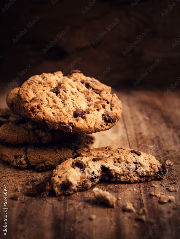 Pile of Chocolate cookies on wooden table. Pile of Chocolate cookies on wooden table.