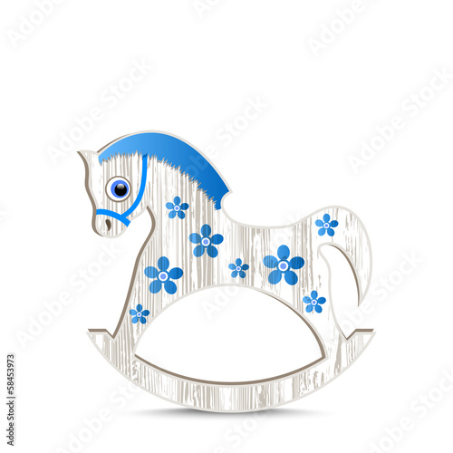 wooden toy horse with flowers