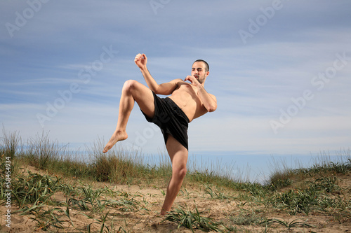 kick boxer practising outside