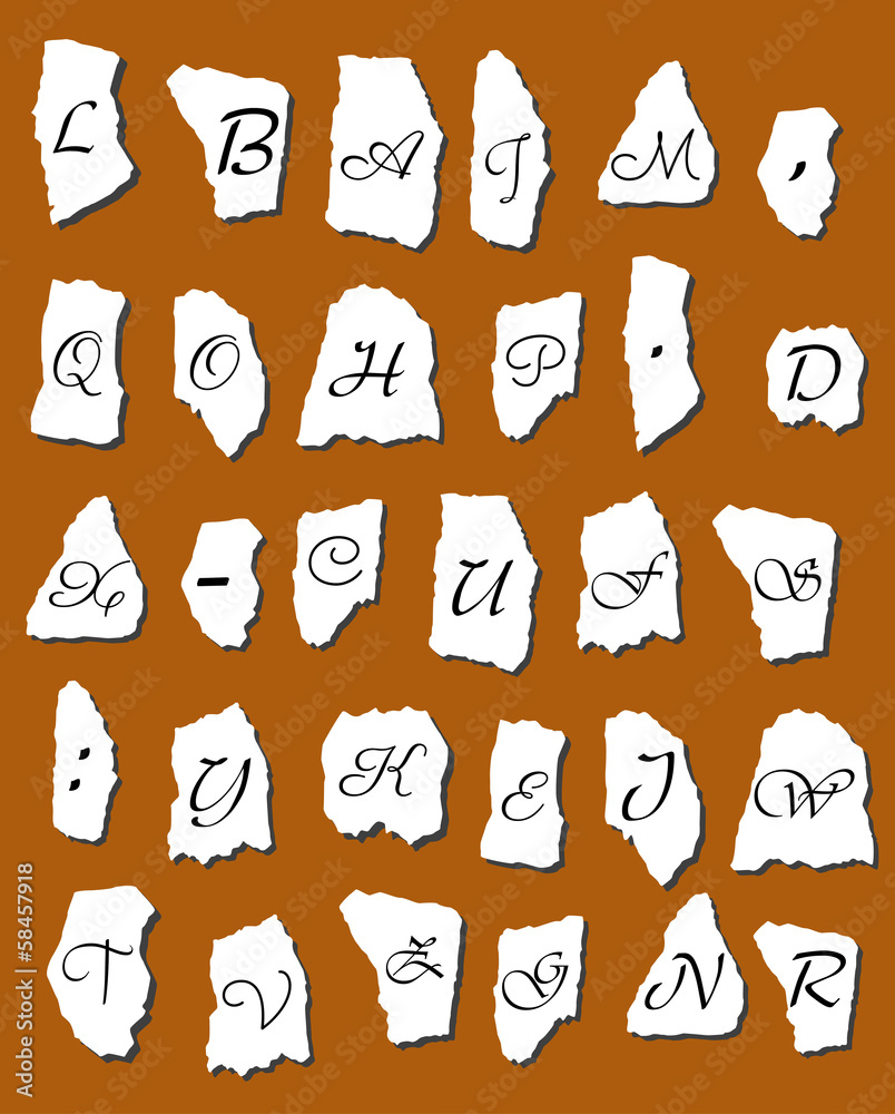 Alphabet letters on scraps of paper Alphabet letters on scraps of paper