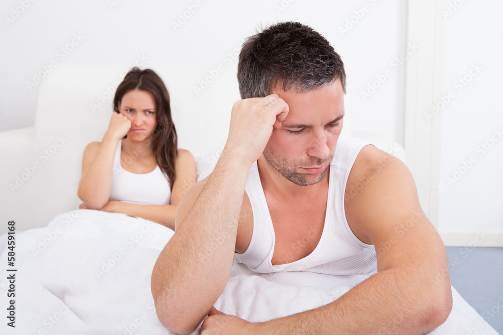 Frustrated Couple On Bed Frustrated Couple On Bed