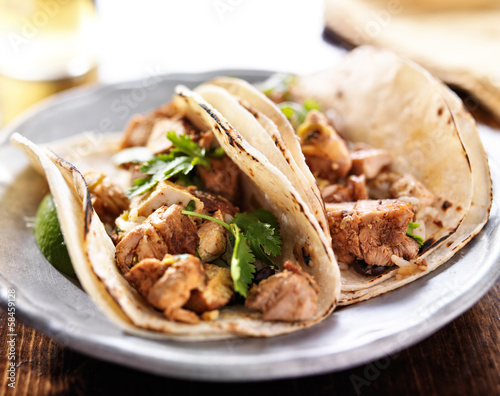 authentic mexican tacos with chicken and cilantro