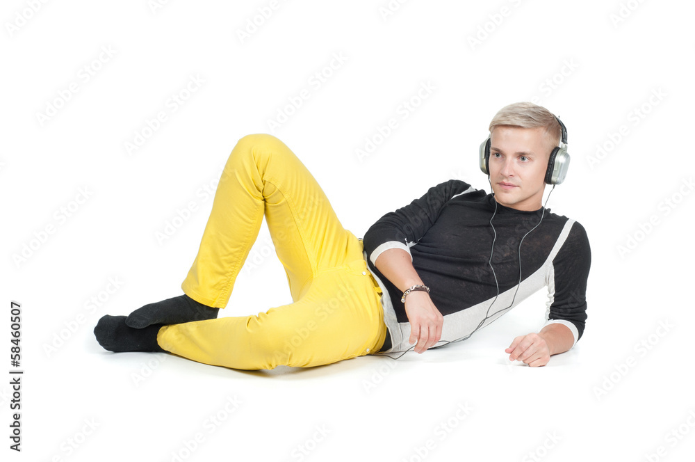 Man in headphones lying watching on you