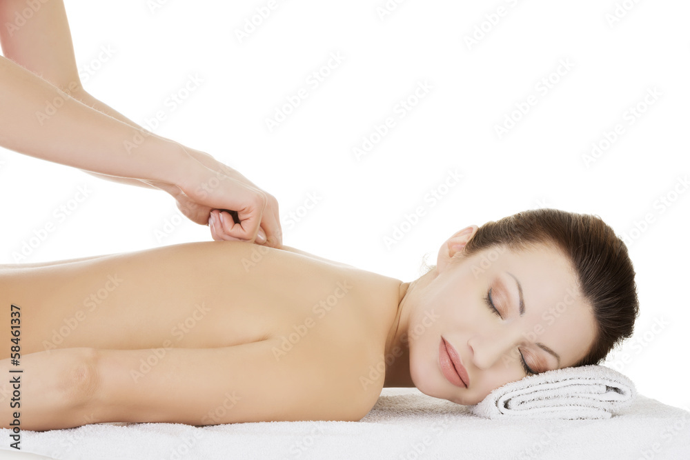 Preaty woman relaxing being massaged in spa saloon. Preaty woman relaxing being massaged in spa saloon.