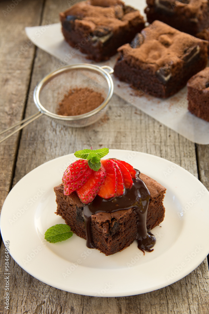 Chocolate brownie cake with strawberries. Chocolate brownie cake with strawberries.