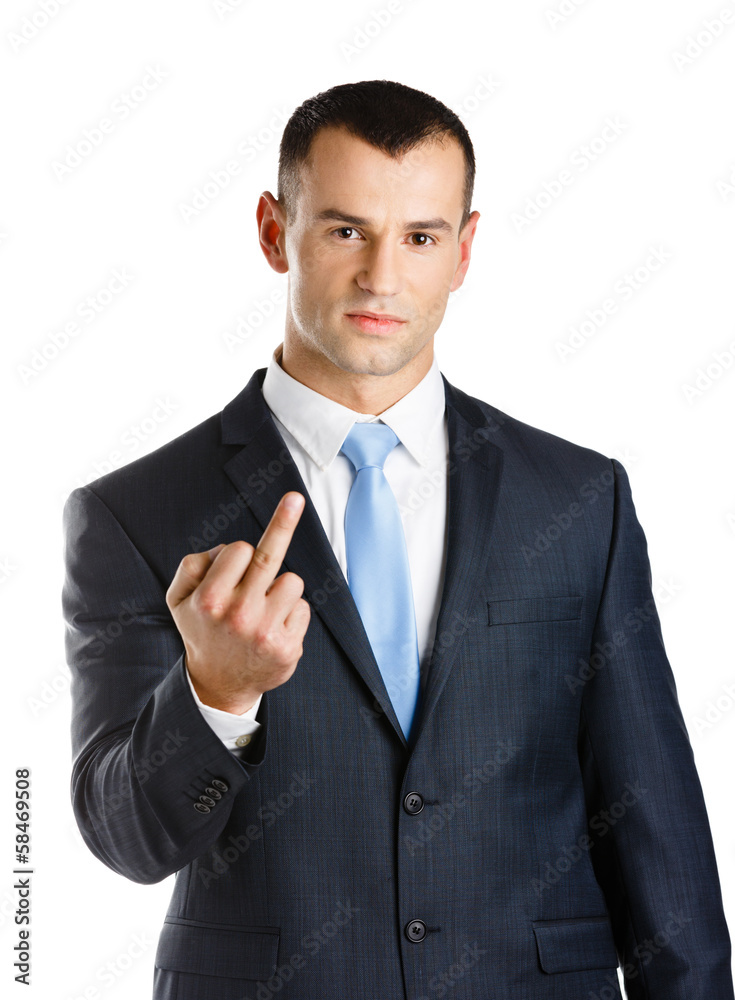 Businessman showing obscene gesture, isolated Businessman showing obscene gesture, isolated