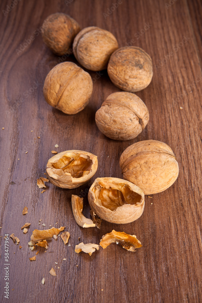 walnuts on a wooden background walnuts on a wooden background