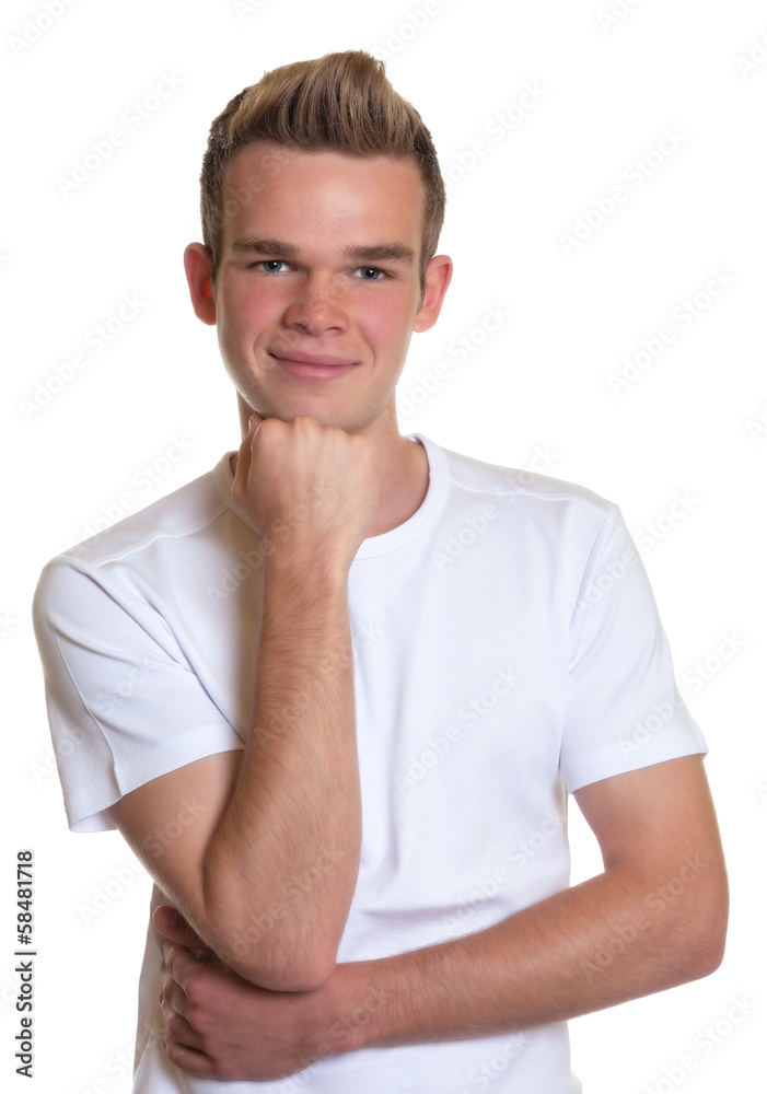 Attractive guy with blond hair smiling at camera Attractive guy with blond hair smiling at camera