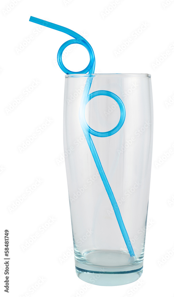 Tall empty glass with a straw