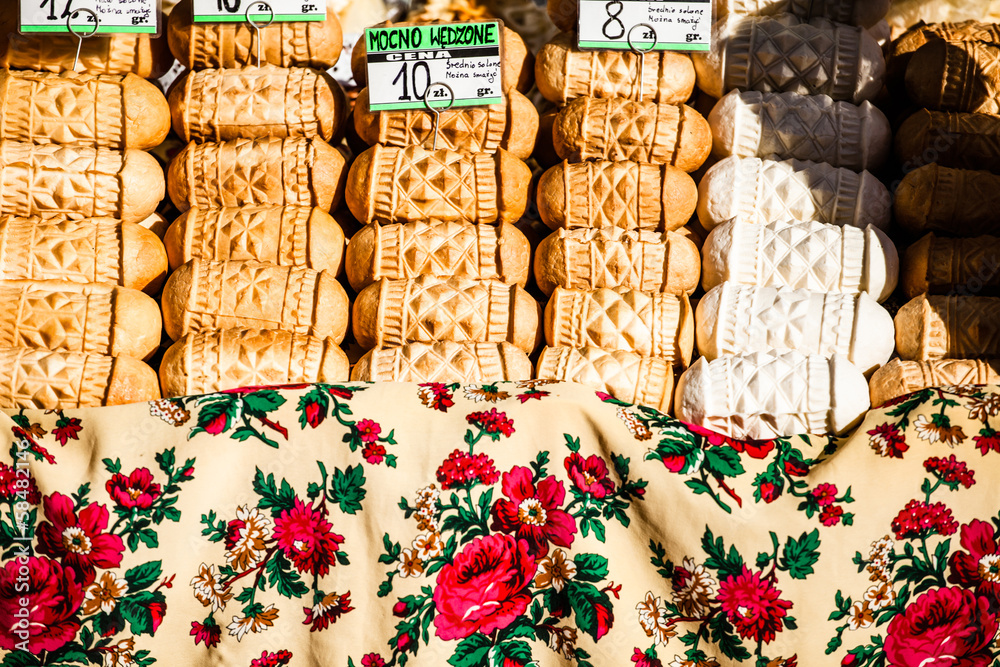 Fototapeta premium Traditional polish smoked cheese oscypek on market in Zakopane