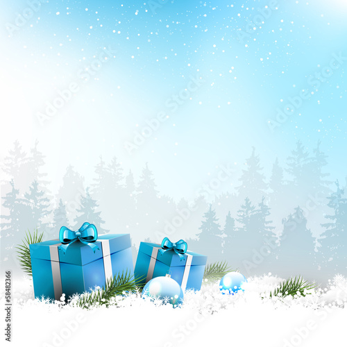 Christmas winter landscape with blue gift boxes and copyspace