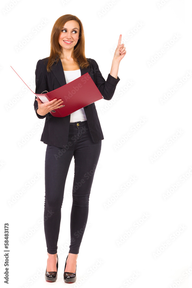 Cheerful businesswoman with ring binder pointing up. Cheerful businesswoman with ring binder pointing up.
