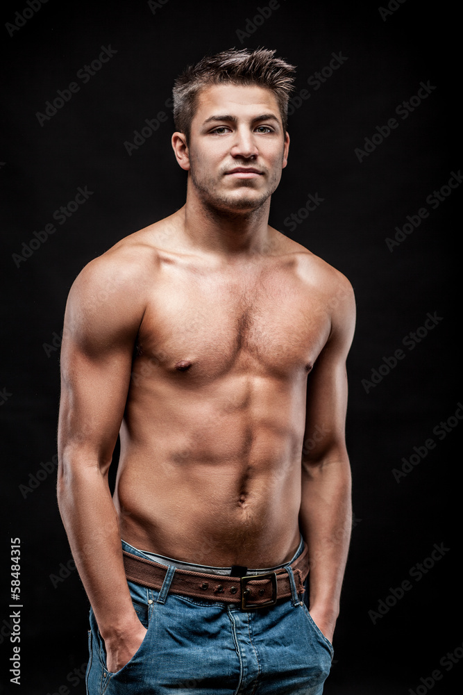 Fototapeta premium young man on dark background