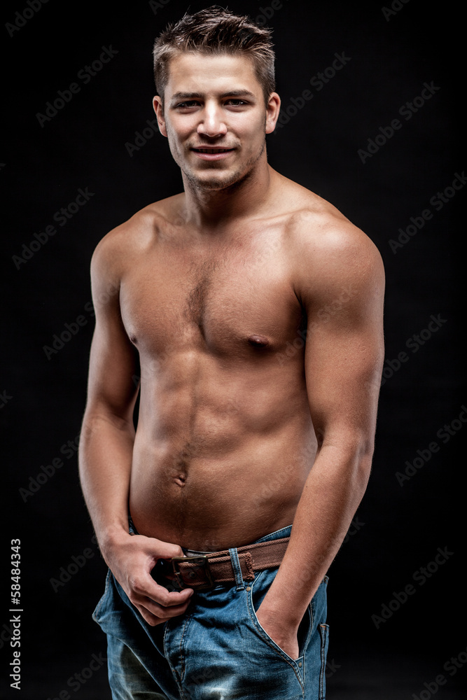 young man on dark background