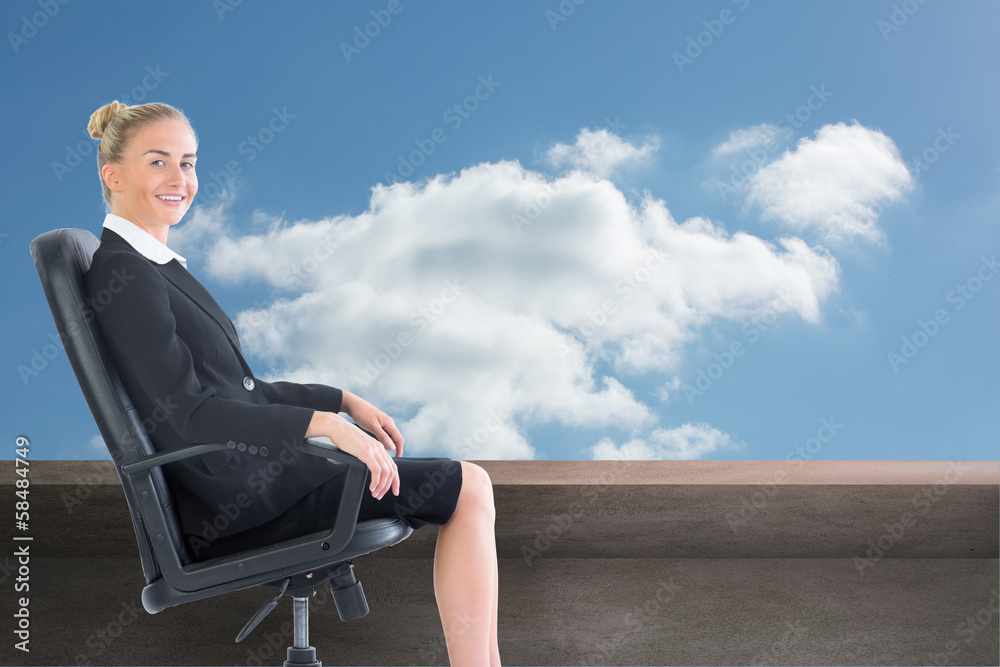 Composite image of businesswoman sitting in swivel chair Composite image of businesswoman sitting in swivel chair