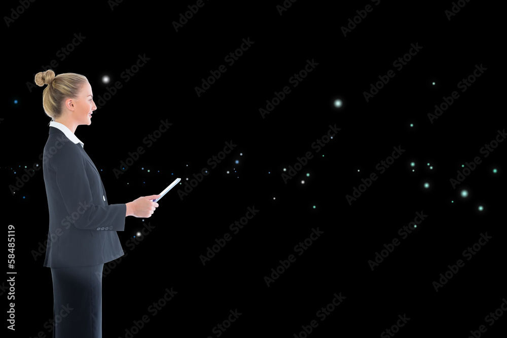 Composite image of businesswoman holding new tablet Composite image of businesswoman holding new tablet