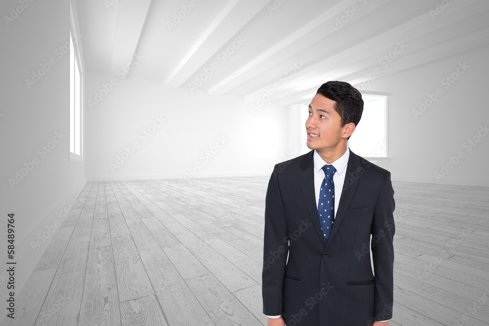 Composite image of smiling asian businessman Composite image of smiling asian businessman