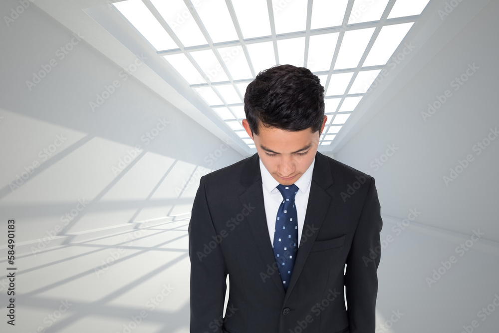 Composite image of serious asian businessman Composite image of serious asian businessman