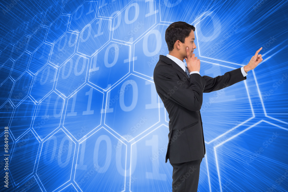 Composite image of thoughtful asian businessman pointing Composite image of thoughtful asian businessman pointing