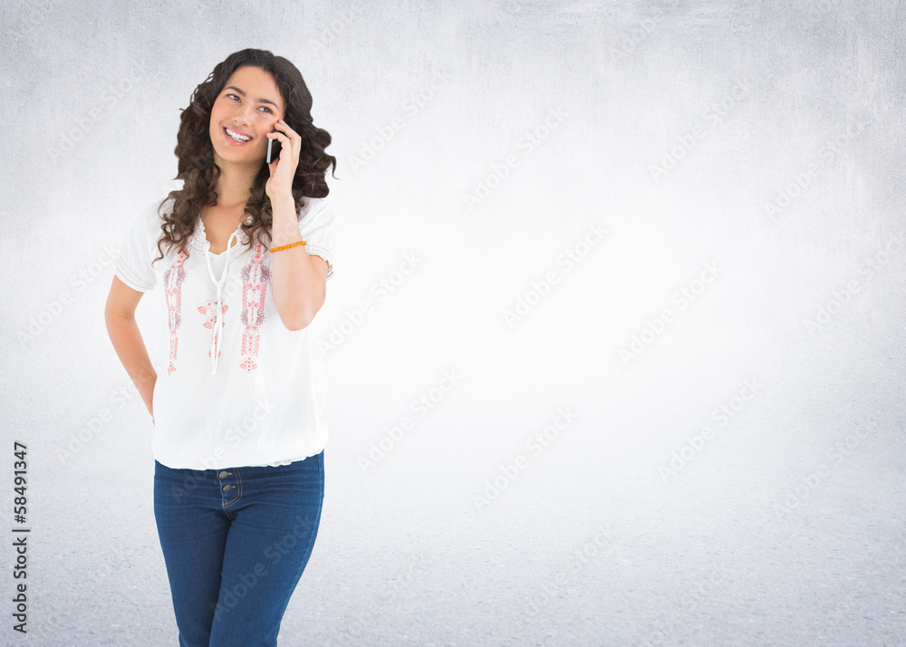 Composite image of attractive casual brunette having phone call