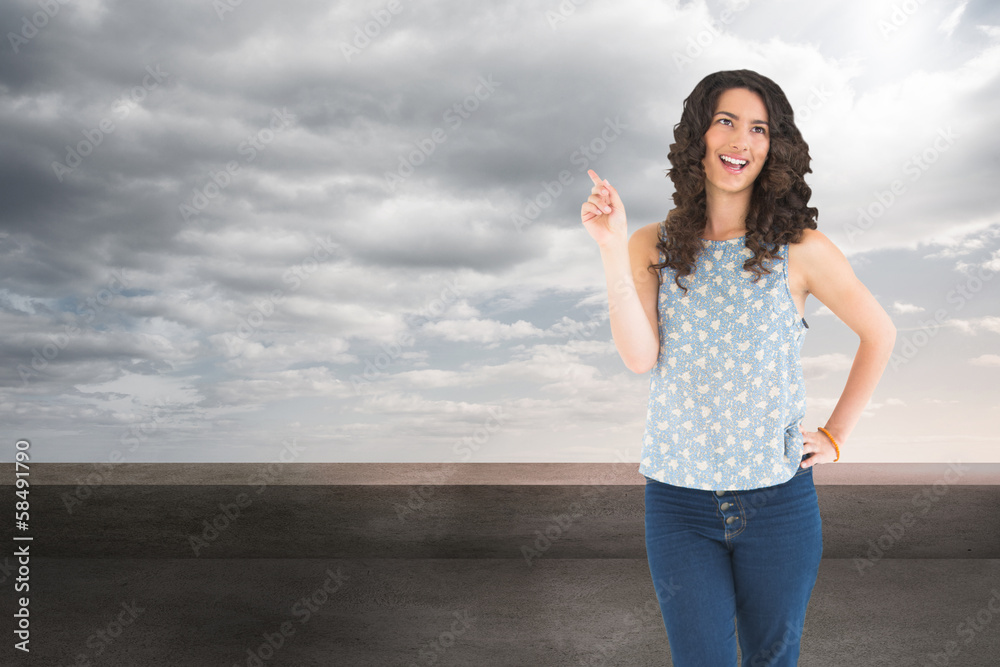 Composite image of happy beautiful brunette posing Composite image of happy beautiful brunette posing