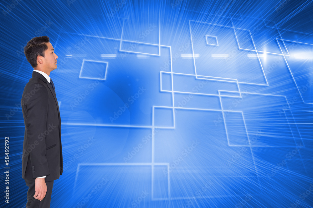 Composite image of unsmiling businessman looking away Composite image of unsmiling businessman looking away