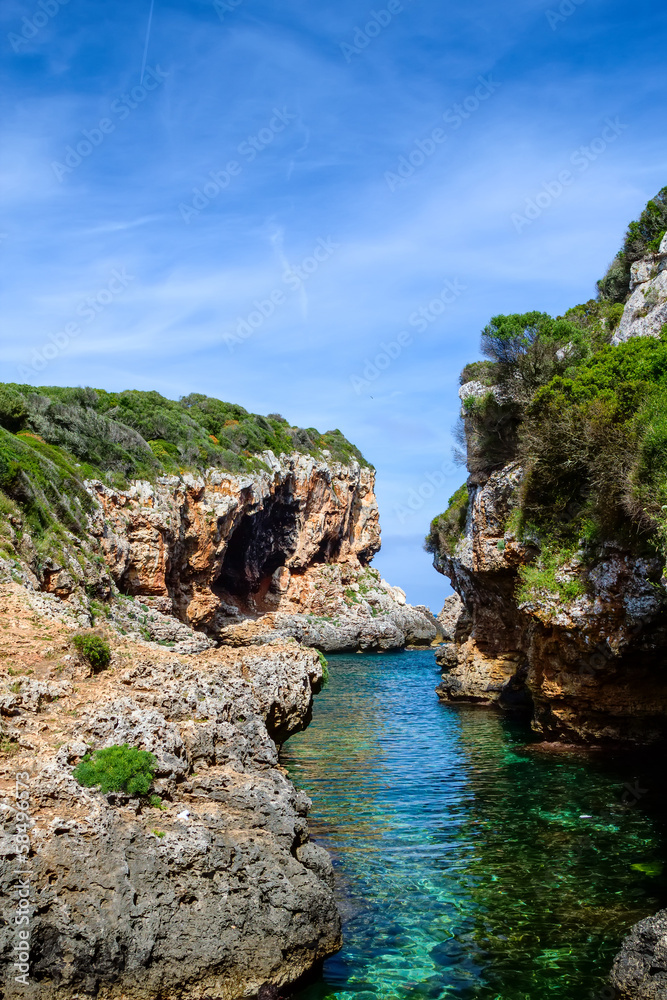 Cala de Rafalet cove in sunny day, Menorca island
