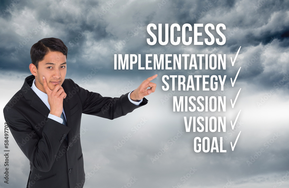 Composite image of thoughtful asian businessman pointing Composite image of thoughtful asian businessman pointing