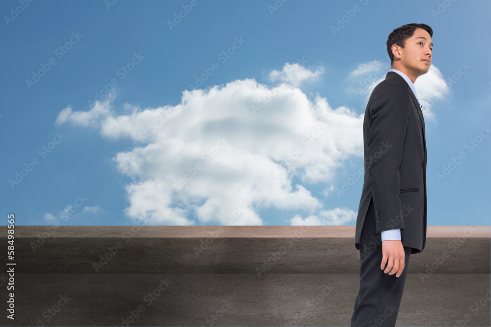 Composite image of serious asian businessman Composite image of serious asian businessman